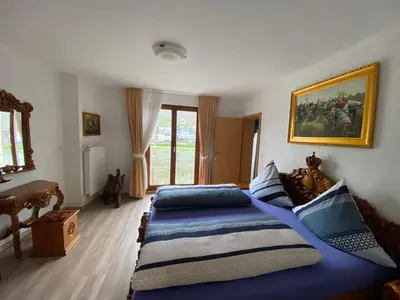 Ein Bett oder Betten in einem Zimmer der Unterkunft Holiday Apartment mit Moselblick im Moselhaus