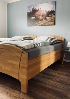 Ein Bett oder Betten in einem Zimmer der Unterkunft [E]ifeel like Home