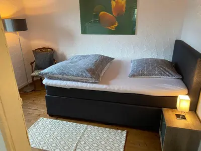 Ein Bett oder Betten in einem Zimmer der Unterkunft Am Osterberg