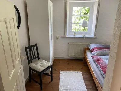 Ein Bett oder Betten in einem Zimmer der Unterkunft Am Osterberg