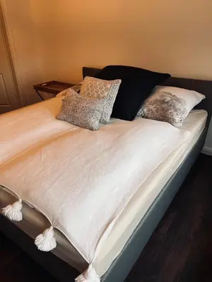 Ein Bett oder Betten in einem Zimmer der Unterkunft Ring Residenz in Adenau direkt am Nürburgring