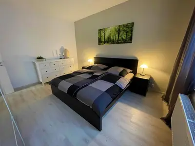 Ein Bett oder Betten in einem Zimmer der Unterkunft Ferienwohnung Kutscher