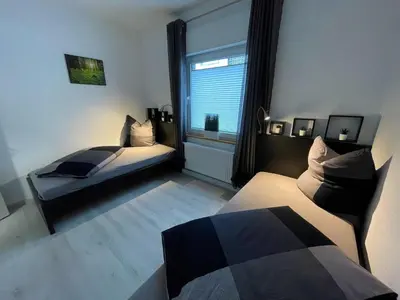 Ein Bett oder Betten in einem Zimmer der Unterkunft Ferienwohnung Kutscher