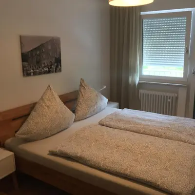 Ein Bett oder Betten in einem Zimmer der Unterkunft Ferienwohnung „Zur alten Brauerei“