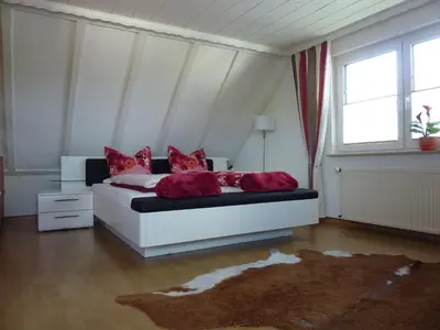 Ein Bett oder Betten in einem Zimmer der Unterkunft Ferienwohnung Hanna