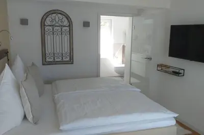 Ein Bett oder Betten in einem Zimmer der Unterkunft Haus Weingarten