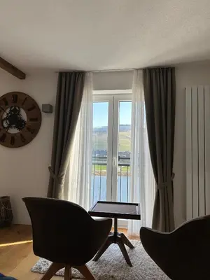 Ein Sitzbereich in der Unterkunft Haus Weingarten