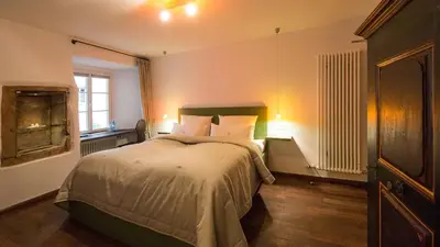 Ein Bett oder Betten in einem Zimmer der Unterkunft Romantik Hotel Meisenheimer Hof