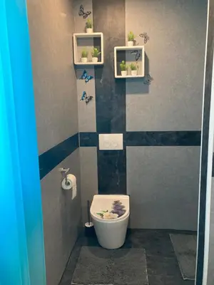 Ein Badezimmer in der Unterkunft Modern mitten in der Stadt und doch sehr ruhig 2 Minuten zu Therme