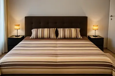 Ein Bett oder Betten in einem Zimmer der Unterkunft Apartments an der Lahn