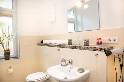 Ein Badezimmer in der Unterkunft Apartments an der Lahn