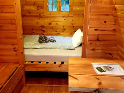 Ein Bett oder Betten in einem Zimmer der Unterkunft Pods Alte Schule