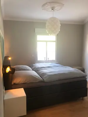Ein Bett oder Betten in einem Zimmer der Unterkunft MoselLiebe
