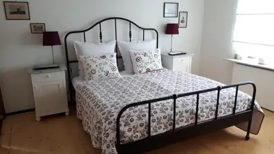 Ein Bett oder Betten in einem Zimmer der Unterkunft bel-etage