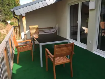 Ein Balkon oder eine Terrasse in der Unterkunft Dachterrassenwohnung - nah am See