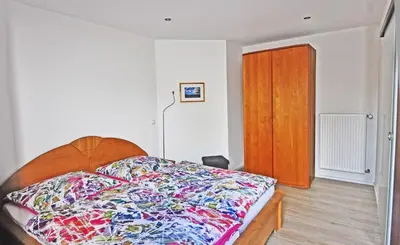 Ein Bett oder Betten in einem Zimmer der Unterkunft Ferienwohnung Nöthen