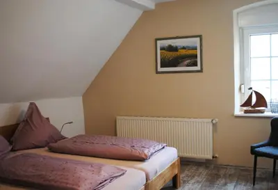 Ein Bett oder Betten in einem Zimmer der Unterkunft Moselena