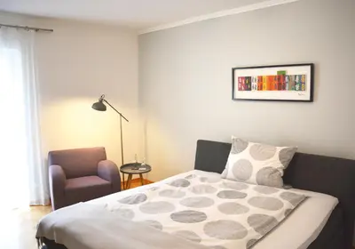 Ein Bett oder Betten in einem Zimmer der Unterkunft Gästehaus No. 3