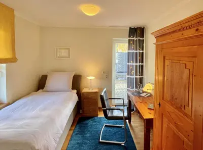 Ein Bett oder Betten in einem Zimmer der Unterkunft Gästehaus No. 3
