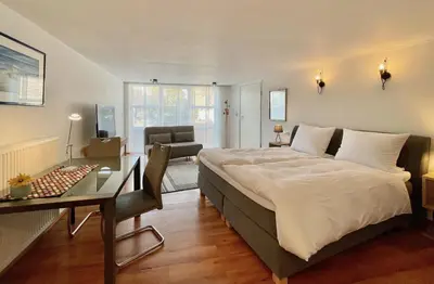 Ein Bett oder Betten in einem Zimmer der Unterkunft Gästehaus No. 3
