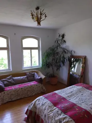 Ein Bett oder Betten in einem Zimmer der Unterkunft Ferienbahnhof Utzerath