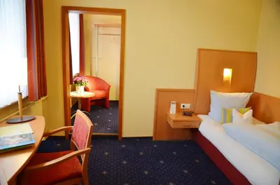 Ein Bett oder Betten in einem Zimmer der Unterkunft Tannenheim