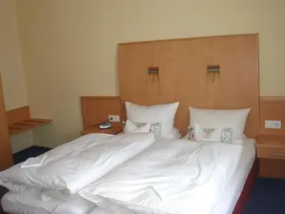 Ein Bett oder Betten in einem Zimmer der Unterkunft Tannenheim