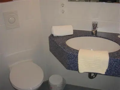 Ein Badezimmer in der Unterkunft Tannenheim