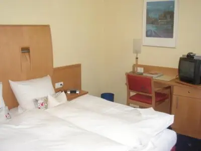 Ein Bett oder Betten in einem Zimmer der Unterkunft Tannenheim