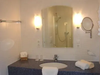 Ein Badezimmer in der Unterkunft Tannenheim