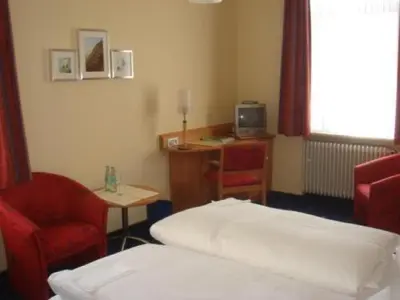 Ein Bett oder Betten in einem Zimmer der Unterkunft Tannenheim