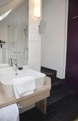 Ein Badezimmer in der Unterkunft Tannenheim