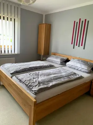Ein Bett oder Betten in einem Zimmer der Unterkunft Haus Sonnenschein