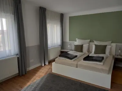 Ein Bett oder Betten in einem Zimmer der Unterkunft Ferienhaus Heiner und Walter