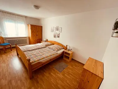 Ein Bett oder Betten in einem Zimmer der Unterkunft Moselferienhaus Porten