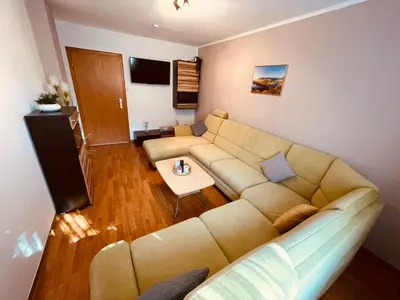 Ein Sitzbereich in der Unterkunft Moselferienhaus Porten