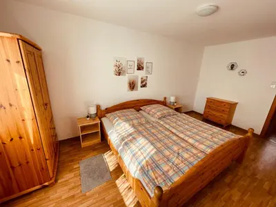 Ein Bett oder Betten in einem Zimmer der Unterkunft Moselferienhaus Porten