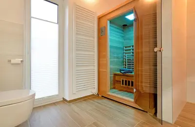 Ein Badezimmer in der Unterkunft Ferienhäuser Brieden - 