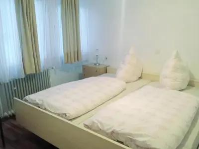 Ein Bett oder Betten in einem Zimmer der Unterkunft Bella Italia - Ferienwohnungen