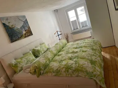 Ein Bett oder Betten in einem Zimmer der Unterkunft Ferienhaus am Fallertor