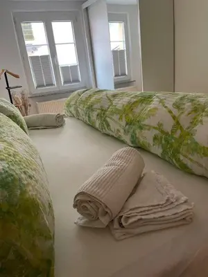 Ein Bett oder Betten in einem Zimmer der Unterkunft Ferienhaus am Fallertor