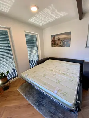 Ein Bett oder Betten in einem Zimmer der Unterkunft Mosel-FeWo-JuLe