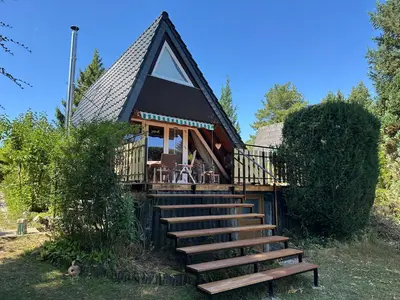 Ein Garten an der Unterkunft Ferienhaus im Feriendorf Freilingen (Eifel).
