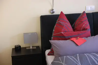 Ein Bett oder Betten in einem Zimmer der Unterkunft Loreley Hills Residence 2