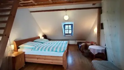 Ein Bett oder Betten in einem Zimmer der Unterkunft Ferienappartement Rondine Bekond