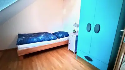 Ein Bett oder Betten in einem Zimmer der Unterkunft Ferienappartement Rondine Bekond