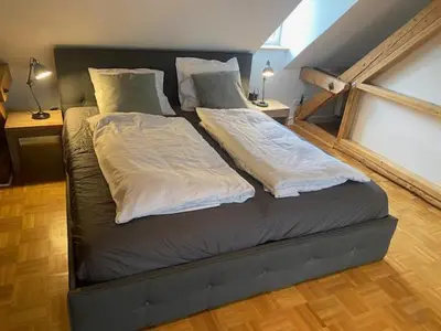 Ein Bett oder Betten in einem Zimmer der Unterkunft Die Strumpffabrik - Guesthouse