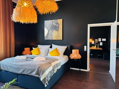 Ein Bett oder Betten in einem Zimmer der Unterkunft Klassen Stay - Exklusive Altbau Apartments - Zentral - Rheinnähe