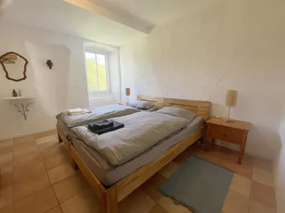 Ein Bett oder Betten in einem Zimmer der Unterkunft Ferienhaus Rehblick