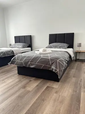 Ein Bett oder Betten in einem Zimmer der Unterkunft Hotel & Restaurant Dalmacija Polch